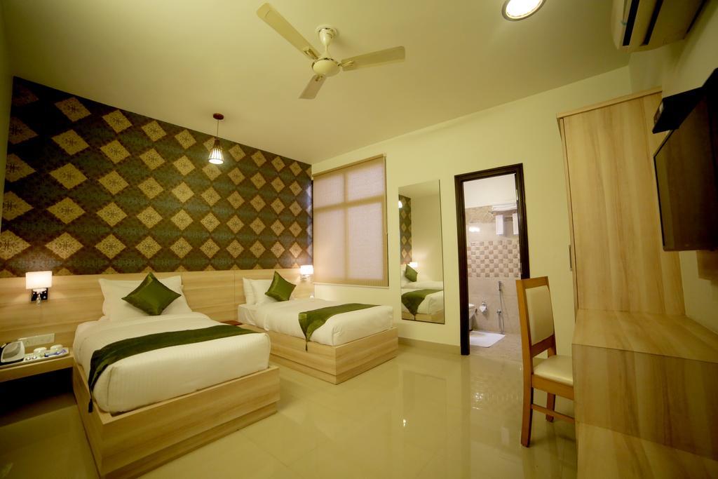 Treebo Signature Inn Malviya Nagar Jaipur Quarto foto